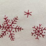 copos de nieve bordados