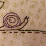 caracol bordado a mano