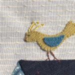 pájaro aplicado en tela de lana