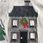 Un quilt de Navidad para decorar el dormitorio