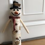 muñeco nieve suelta puertas Bobbins